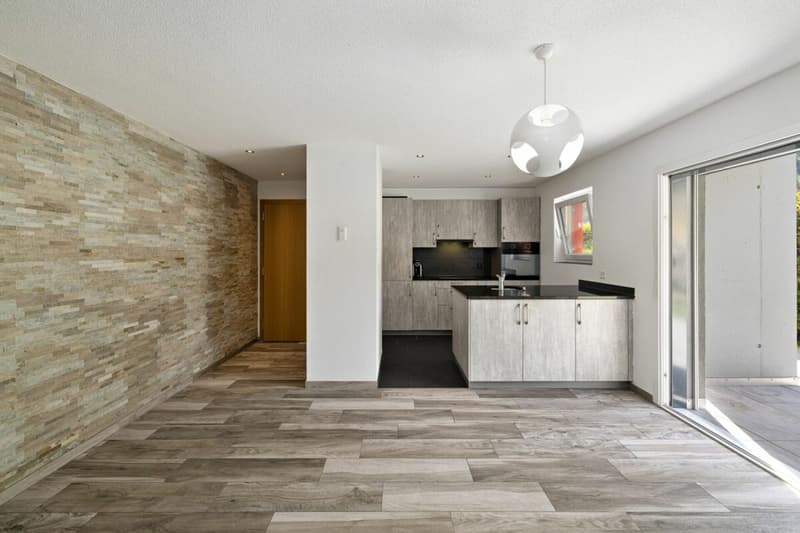 Spacieux 3 pièces 1/2 en rez-de-jardin de 107 m² (4)