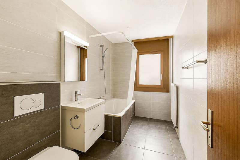 Spacieux appartement de 4,5 pièces en rez-de-jardin (7)