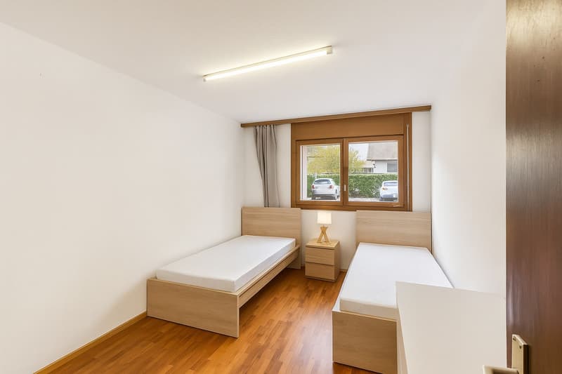 Spacieux appartement de 4,5 pièces en rez-de-jardin (8)