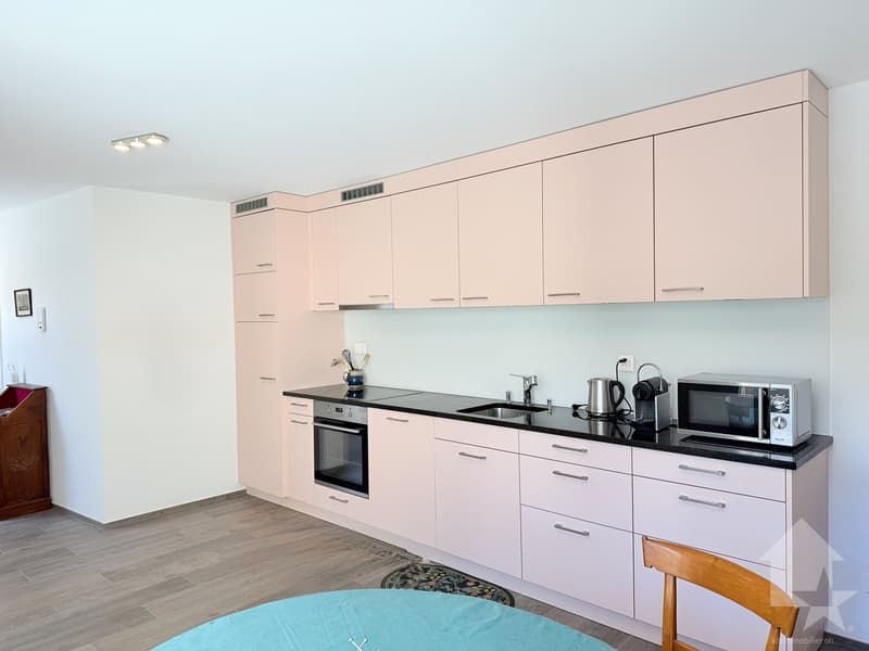 Joli 2.5 pièces avec parking au centre-ville ! (5)