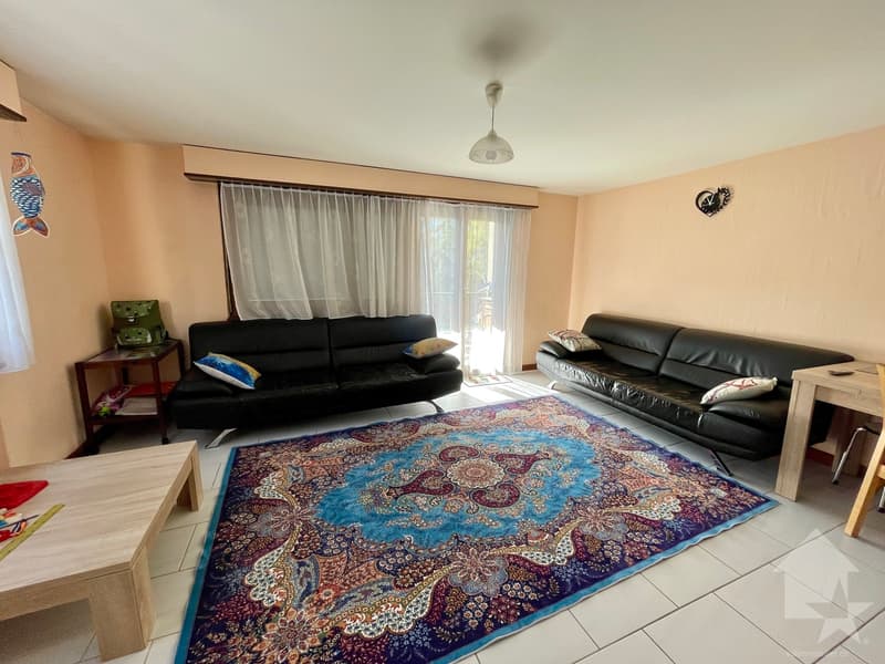 Très agréable 4,5 pièces avec balcon/terrasse au sud et 2 places de parc (3)