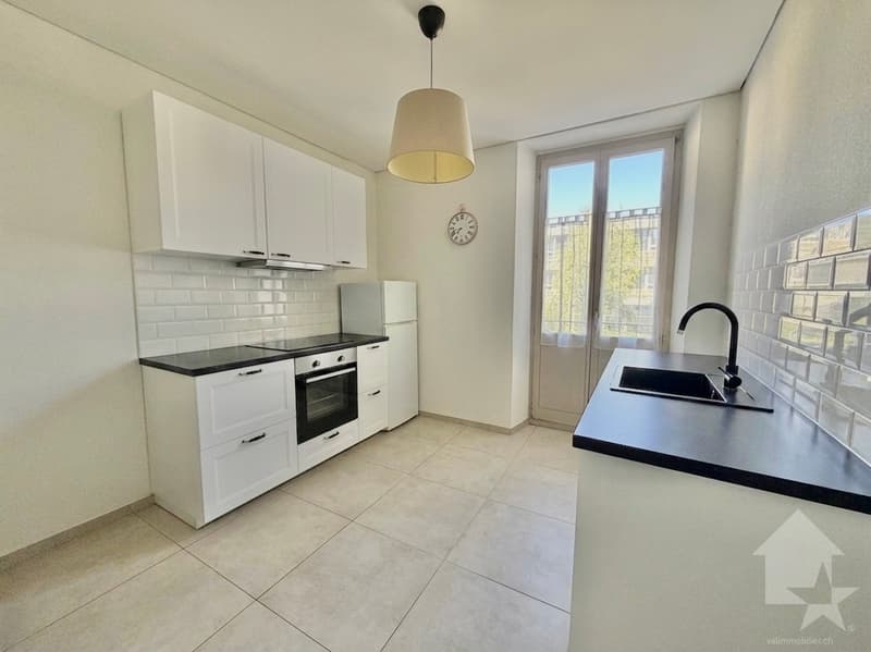 Appartement de 2.5 pièces rénové avec garage box ! (4)