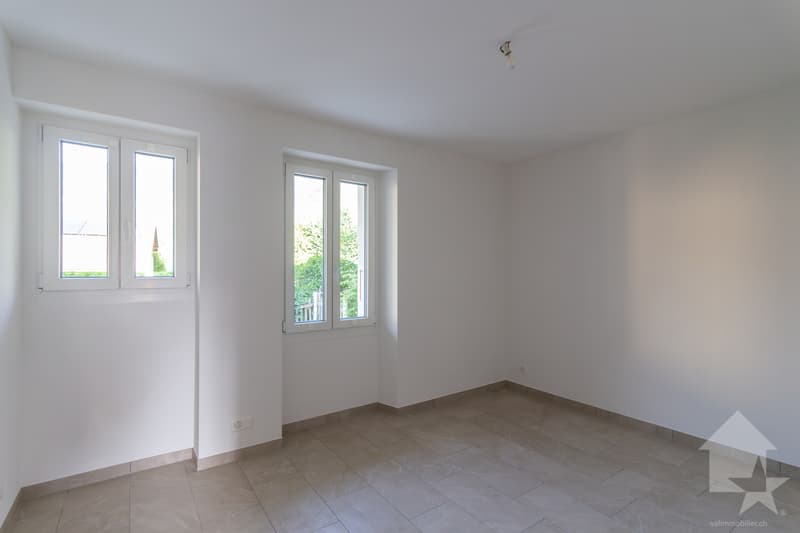 Bâtiment de trois appartements entièrement rénové avec goût (12)