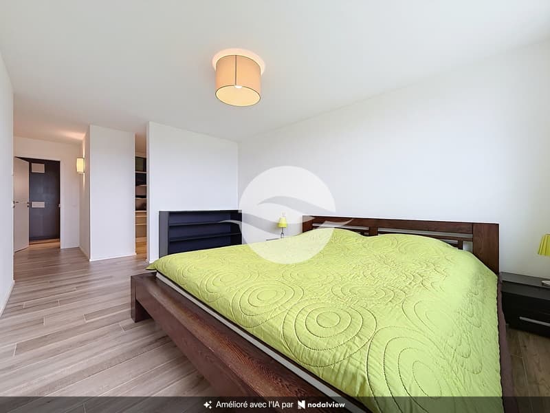 Rez inférieur : Chambre parentale avec dressing et salle d'eau privée