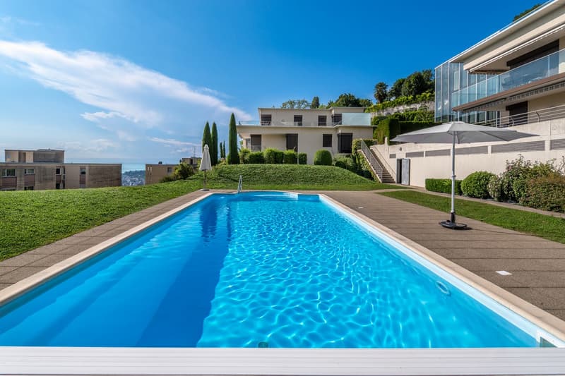 Superbe penthouse avec immense terrasse et vue panoramique sur le lac (7)