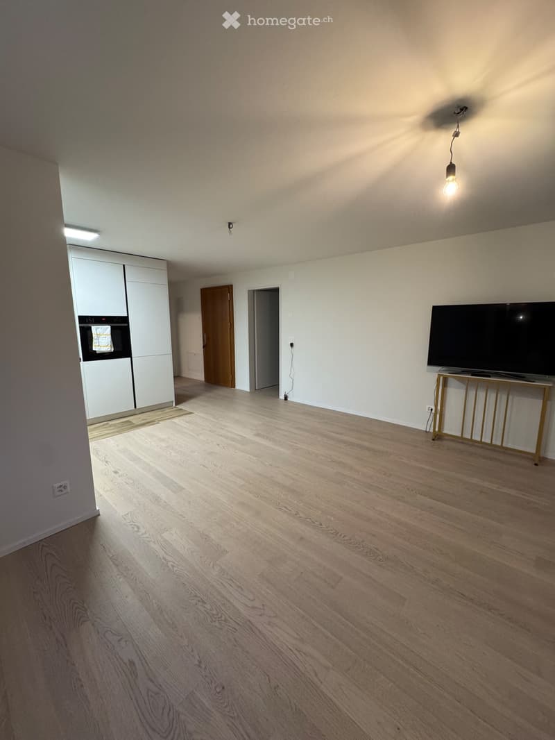 Moderne 3.5-Zimmer-Wohnung mit Balkon und Garage in Winkel (2)