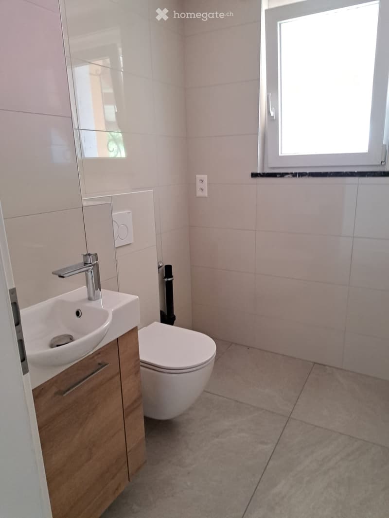 Spacieux appartement meublé avec jardin à Sonceboz (3)