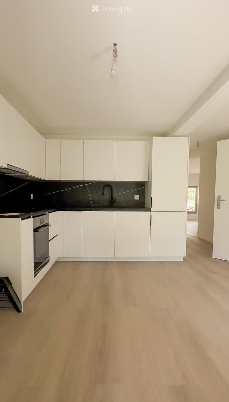 Appartement 2,5 pièces rénové avec jardin & terrassePeseux (3)