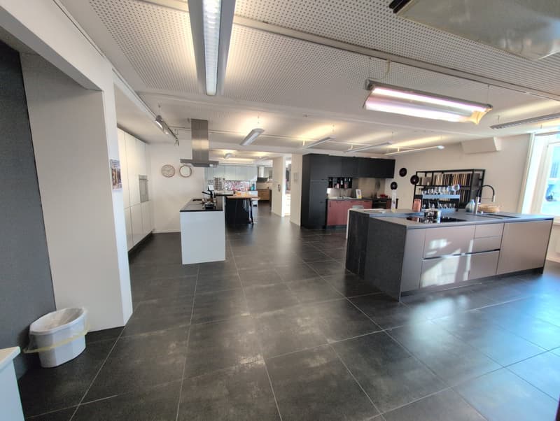 large open kitchen, large kitchen island, cabinets, stove, refrigerator, oven, dishwasher, washing machine