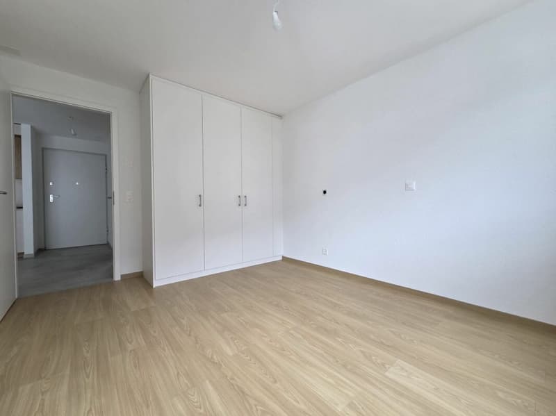 Neuf - Appartement de 2.5 pièces avec balcon et place de parc (4)