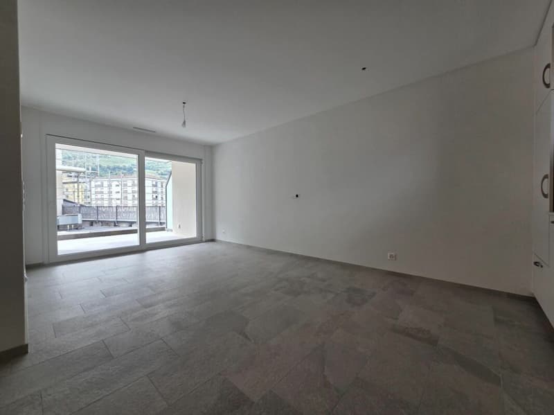 Neuf - Appartement de 2.5 pièces avec balcon et place de parc (2)