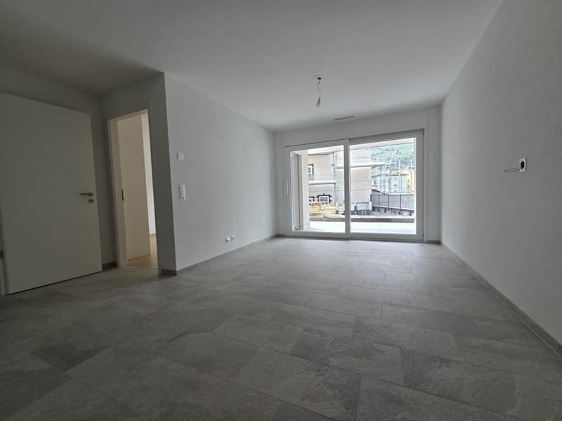 Neuf - Appartement de 2.5 pièces avec balcon et place de parc (3)