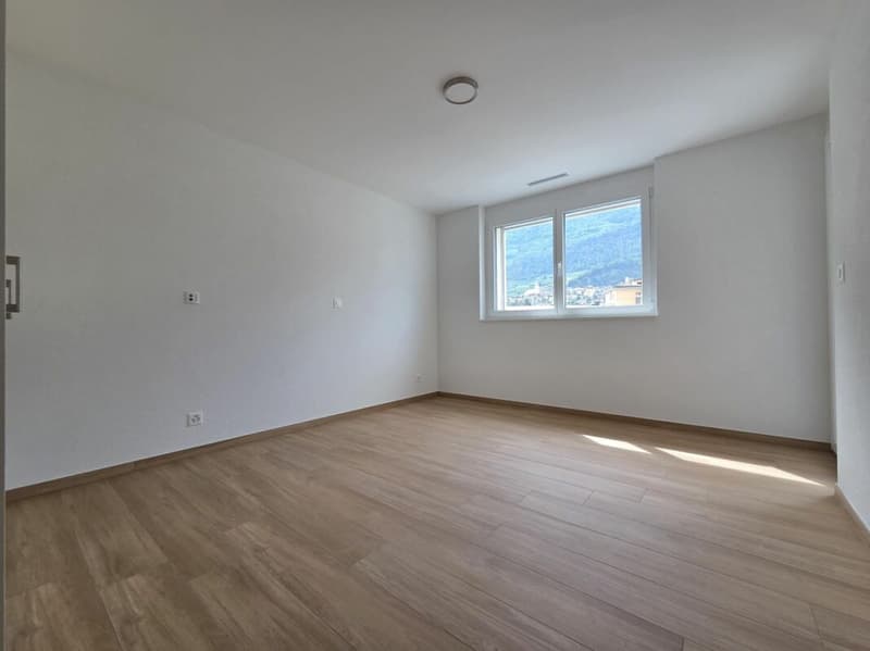 Neuf - Appartement de 3.5 pièces avec balcon et places de parc (4)
