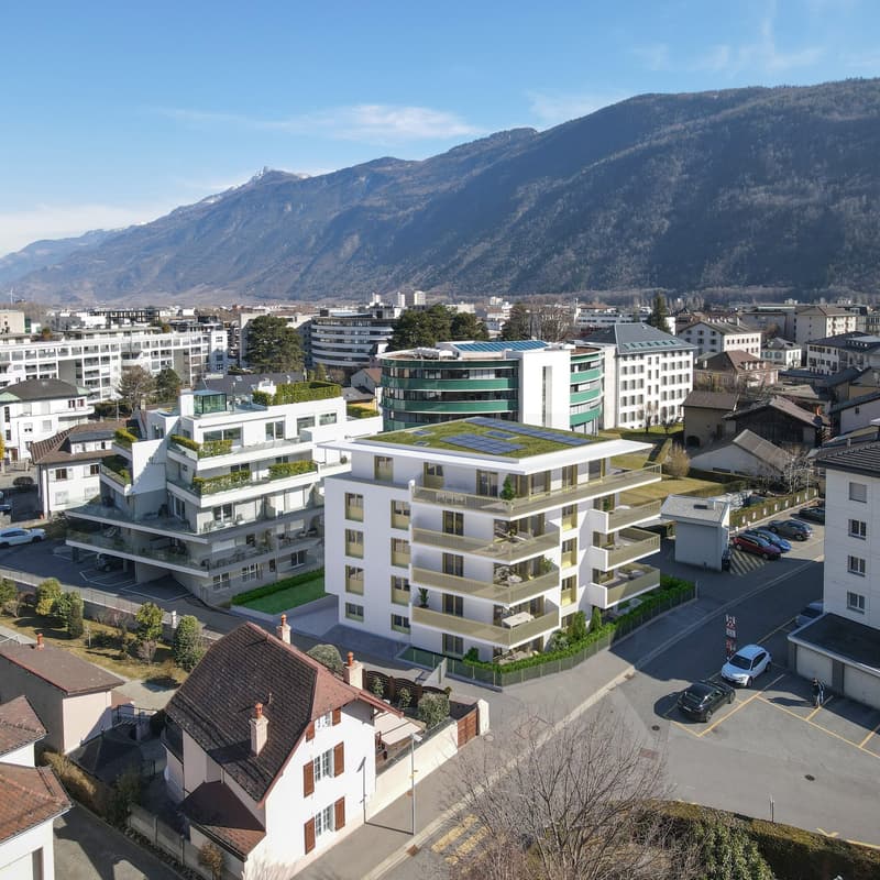 High-rise residential building, multiple balconies, parking spaces, multiple buildings, greenery, mountain view, cars in parking lot