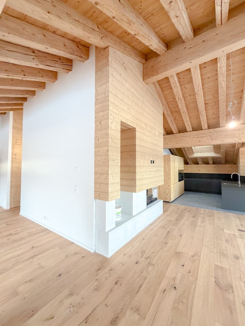fireplace, wooden walls, hardwood floor, white wall