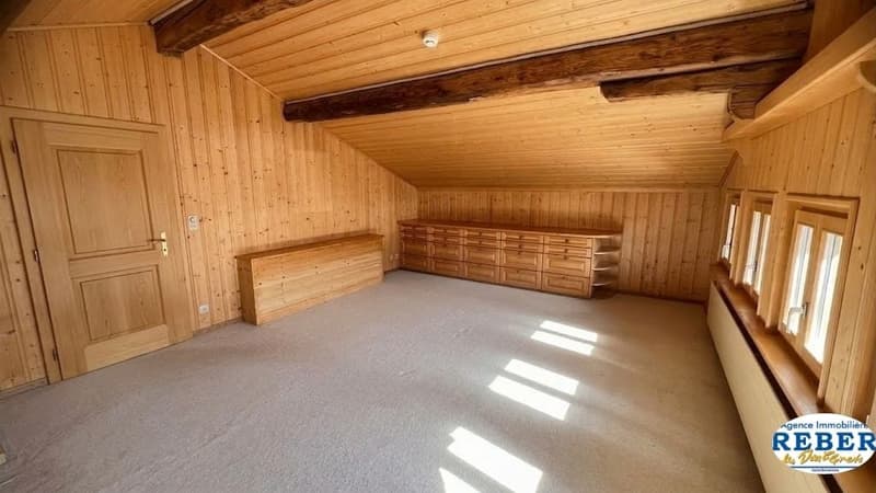 wooden walls, wooden floor, wooden door, wooden cabinets, windows