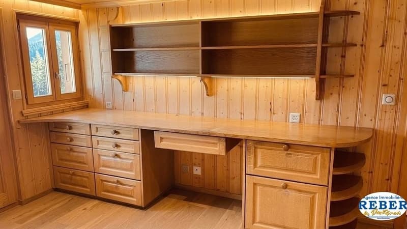 wooden desk, wooden drawers, wooden shelves, power outlets, window