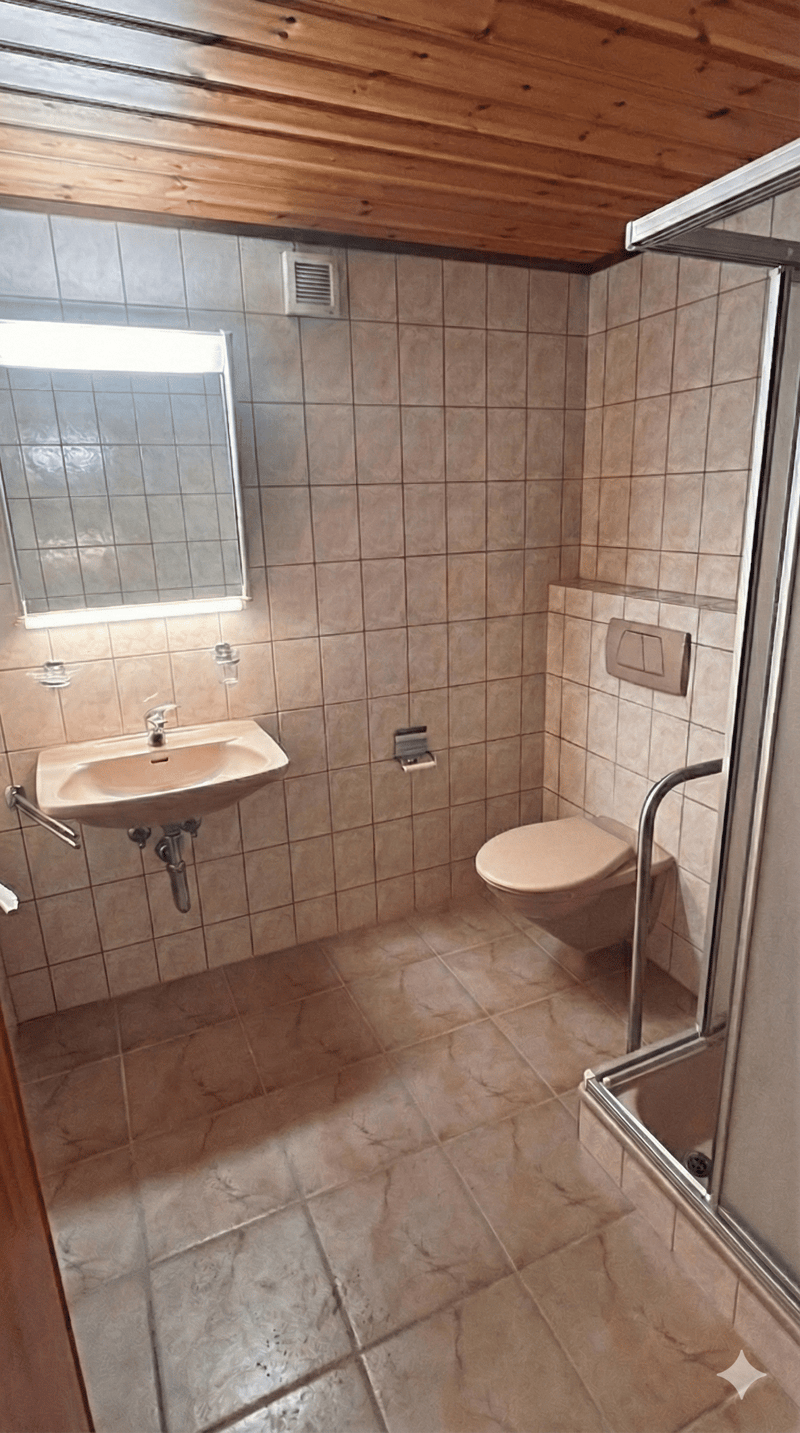 Bathroom with sink, toilet, and shower