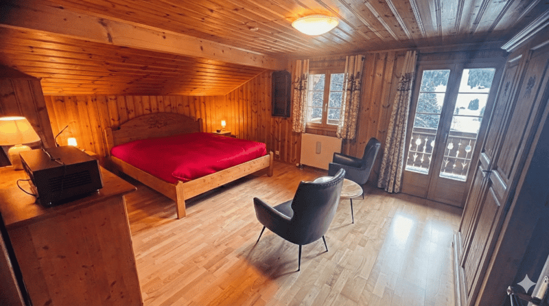 wooden bed, wooden desk, wooden chair, wooden cabinet, wooden floor, lamp, window, radiator