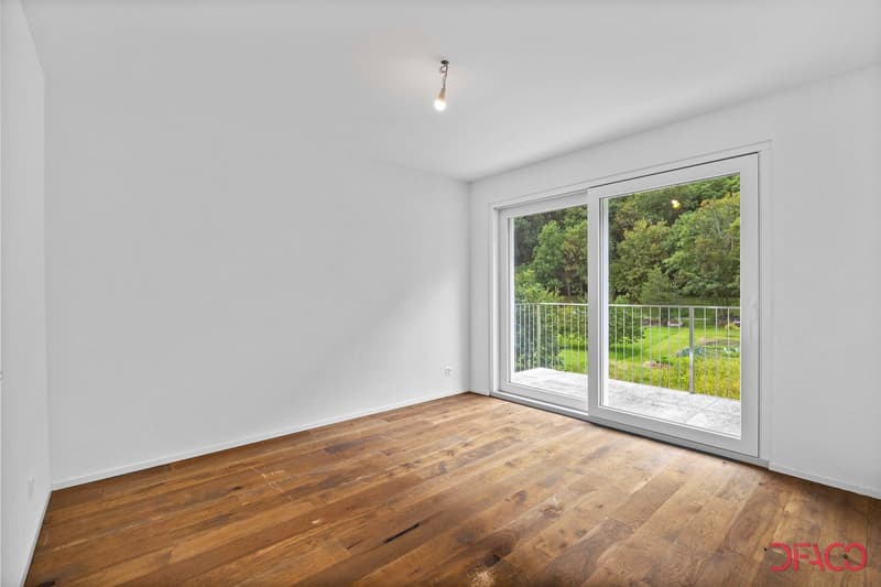 empty room, hardwood floors, white walls, sliding glass doors, balcony with railings