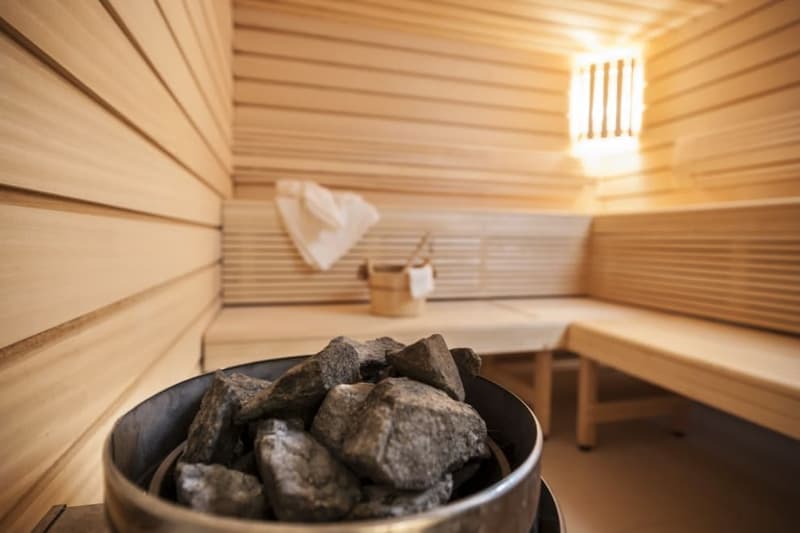 sauna room, wooden bench, bucket, firewood