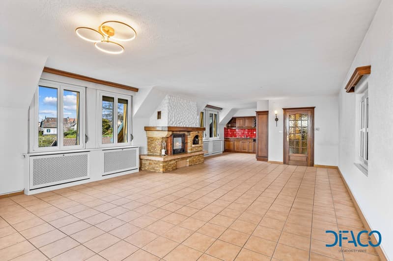 empty room, fireplace, large windows, tiled floor, ceiling lamp