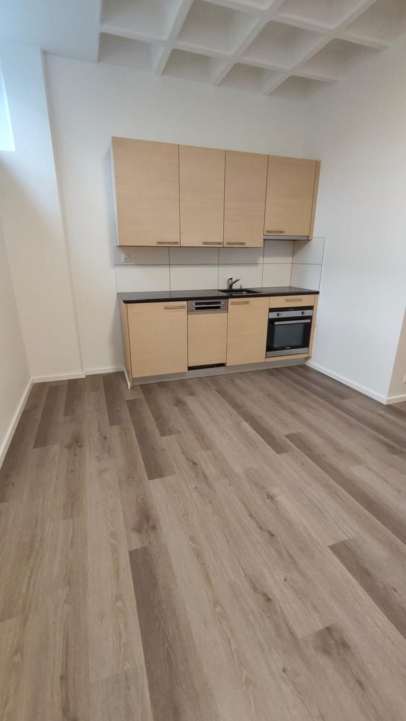 kitchen with wooden cabinets, tiled backsplash, dishwasher, oven, sink, faucet