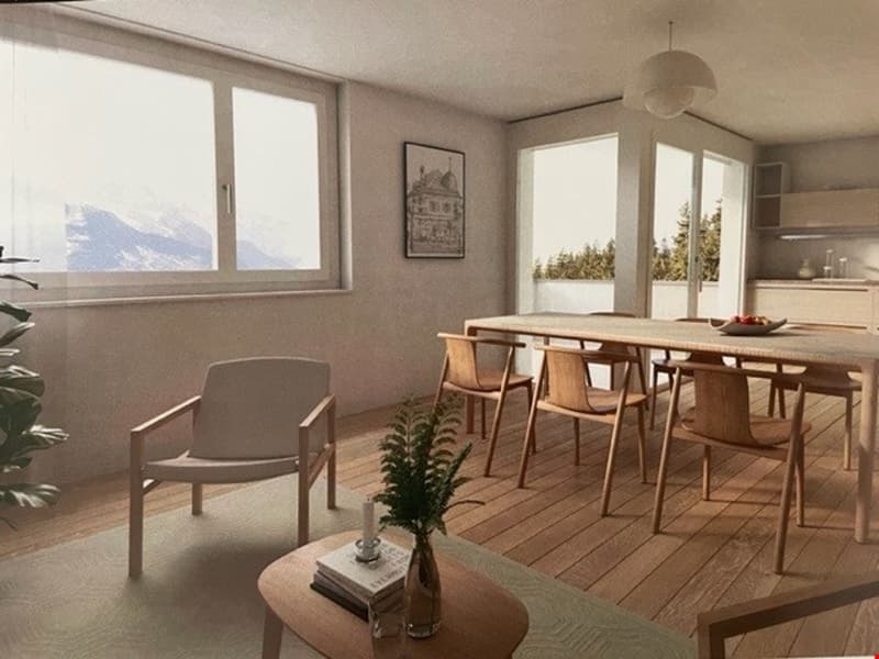 Dining room with wooden floor, windows, a dining table with 8 chairs, and a wooden coffee table with books and a plant. A picture frame and plants are also present in the room.