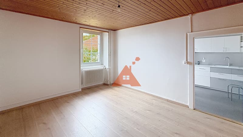 Appartement avec jardin et place de parc, au centre du village (1)