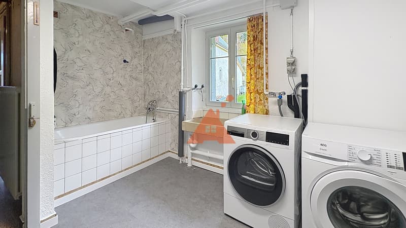 Appartement avec jardin et place de parc, au centre du village (6)