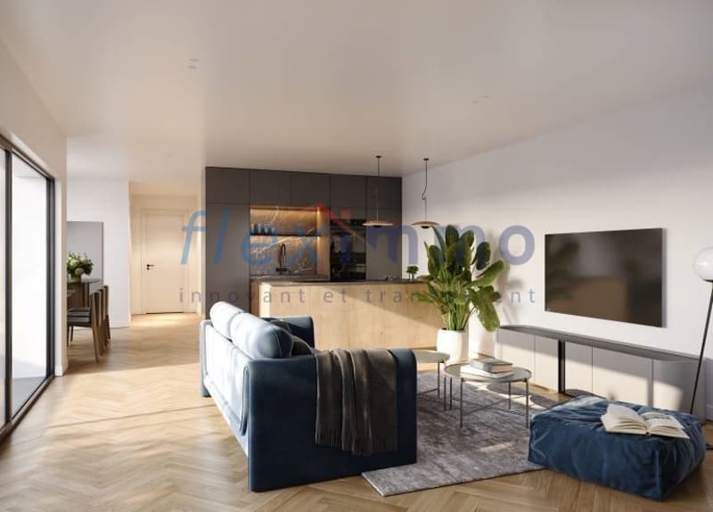 Image non contractuelle / a modern apartment with hardwood floors, a large living room with a blue couch, a tv, and a table with a plant plant on it