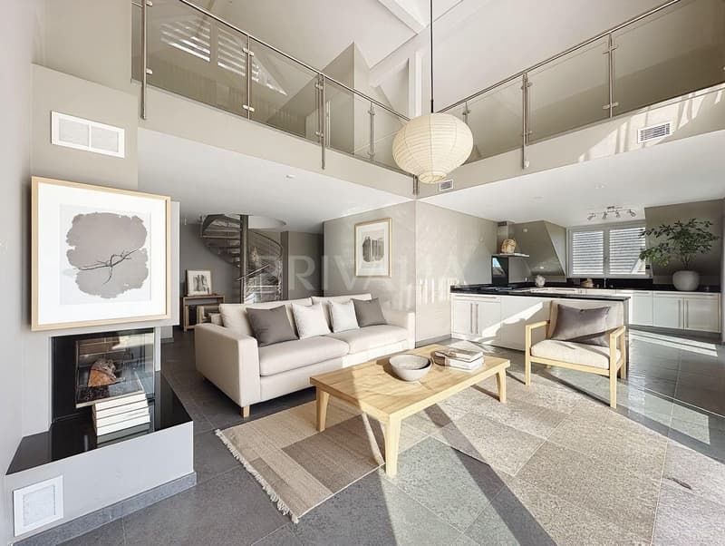 Attique en duplex Minergie de 135 m² avec balcon et cheminée à Mies (2)