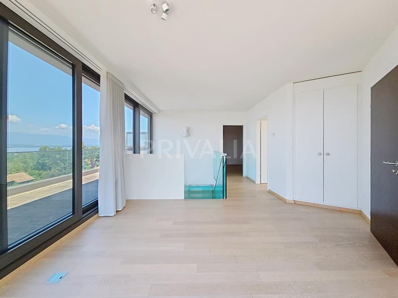 Exceptionnel attique en duplex offrant une vue panoramique sur le lac et les montagnes (6)