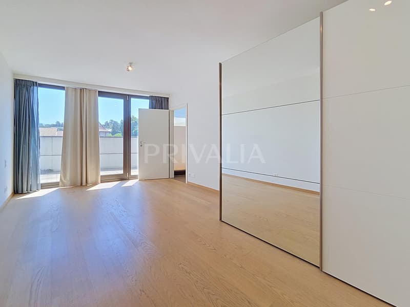 Exceptionnel attique en duplex offrant une vue panoramique sur le lac et les montagnes (4)