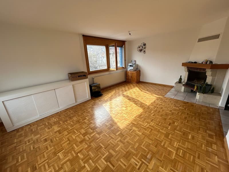 wooden parquet floor, fireplace, large window, wooden cabinet, printer, box, radiator