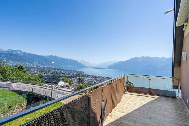 Appartement de prestige rénové avec vue spectaculaire sur le lac ! (5)