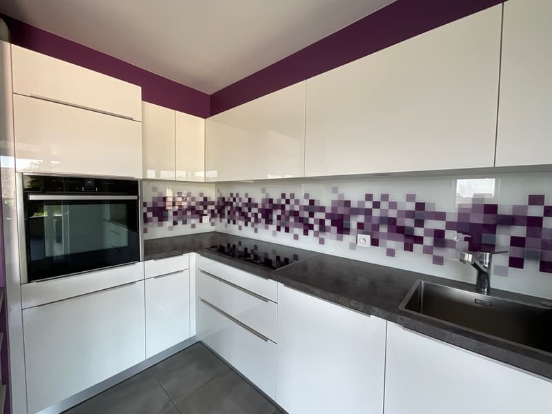 Appartement 4 pièces en attique avec terrasses, garage double, place de parking extérieure et ascenseur (3)