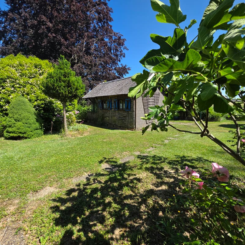 Maison de plain-pied dans un cadre verdoyant exceptionnel de 31 ares (3)