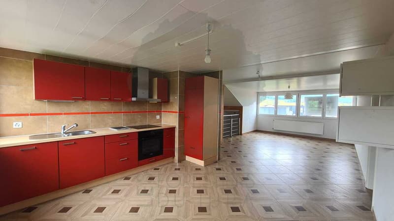 Maison familiale de deux appartements de 3,5 pièces et trois garages (3)