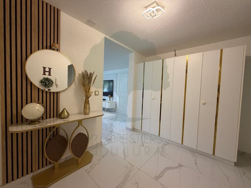 Magnifique appartement rénové de 5,5 pièces avec terrasse et vue (4)