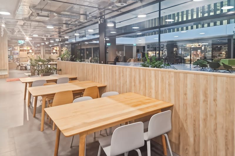 Wooden tables and chairs, wooden partition, air conditioning