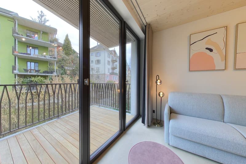 modern interior design, large glass sliding doors, balcony, cozy sofa, floor lamp, art paintings on wall, wooden flooring