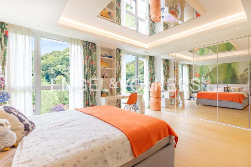 Prestigioso attico fronte lago con terrazza rooftop (10)
