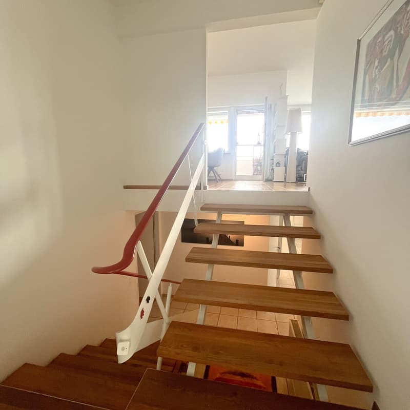 Staircase inside of a raised ground floor house