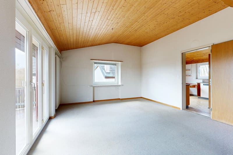 empty room, wooden ceiling, white walls, carpeted floor, sliding glass doors, small window, open door to another room