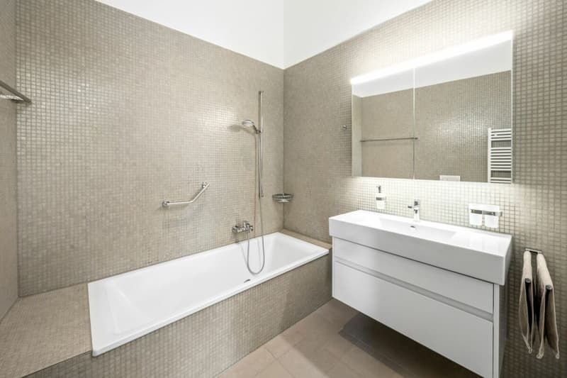 ensuite Badezimmer für erholsame Momente in der Badewanne