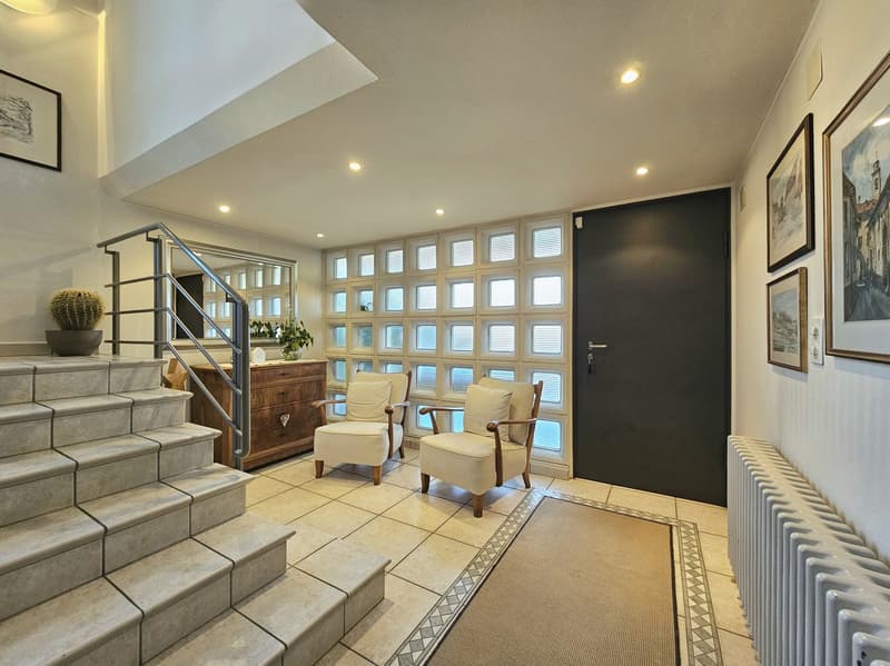 white tiles, wooden cabinet, chairs, radiator, window, stairs, mirror, framed pictures, radiator