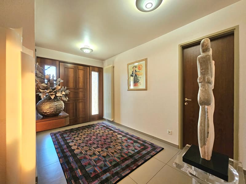Mendrisio: Deliziosa casa unifamiliare contigua con splendido giardino e vista panoramica (5)