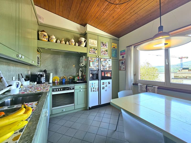 Mendrisio: Deliziosa casa unifamiliare contigua con splendido giardino e vista panoramica (11)