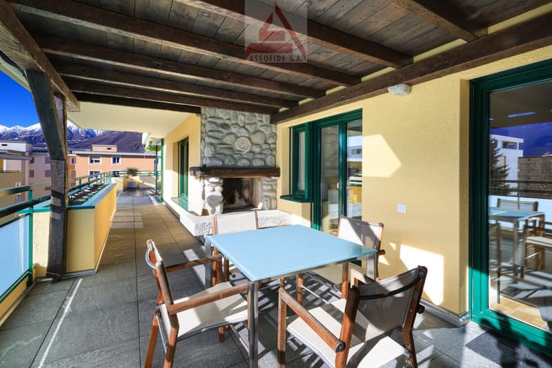 Fireplace, table, chairs, balustrade